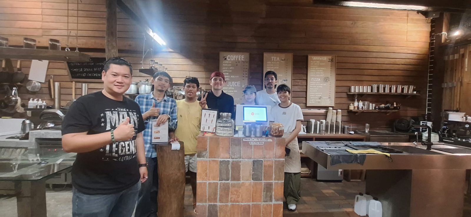 The Homeless House team inside the bar