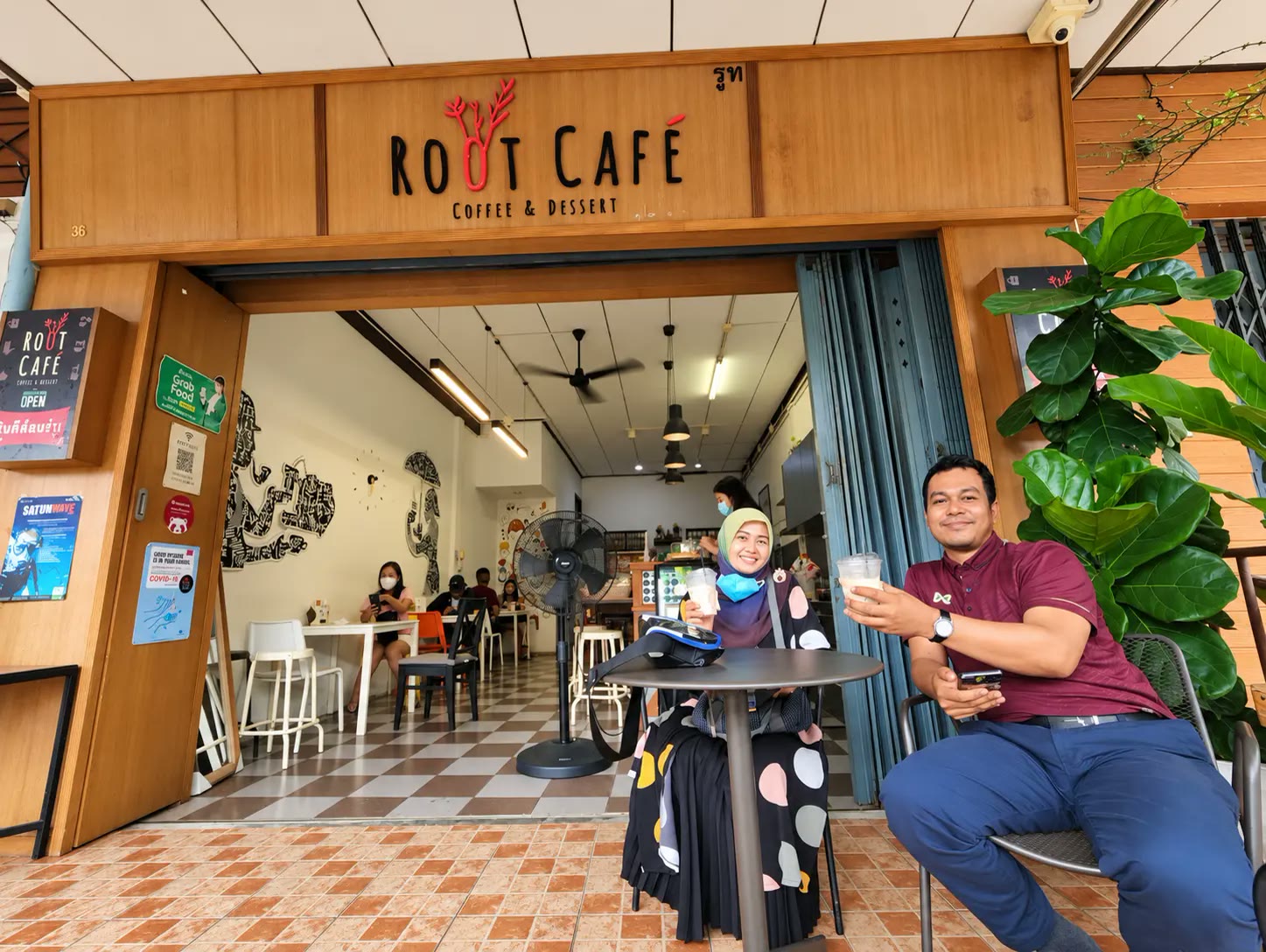 The wooden storefront of Root Cafe, a neighbourhood fixture in Yala for some 12 years.