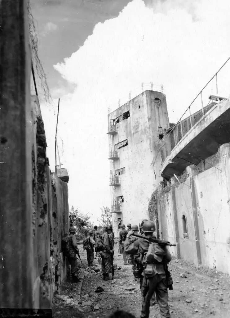 SC 374602 - Elements of the 1st Cav. Div. moving in on Rizal Memorial Stadium, Manila, Luzon, P.I.